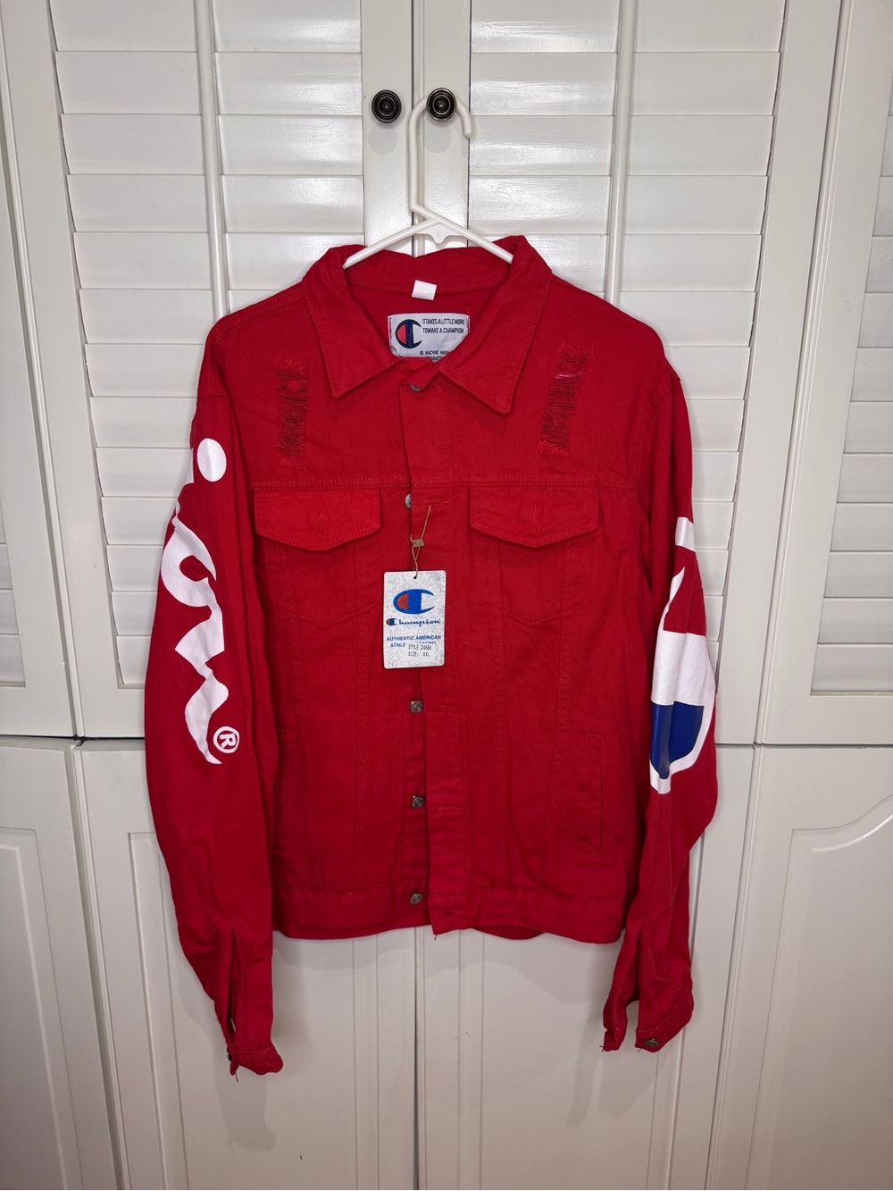 Champion Bright Red Jacket with White Label and Blue Logo Accent